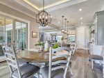 Kitchen and Dining Area with Seating for Six Overlook Pool and Golf Course at 28 Stoney Creek